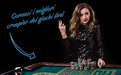 Una croupier davanti ad un tavolo della roulette live per casinò online con delle fiche da gioco.