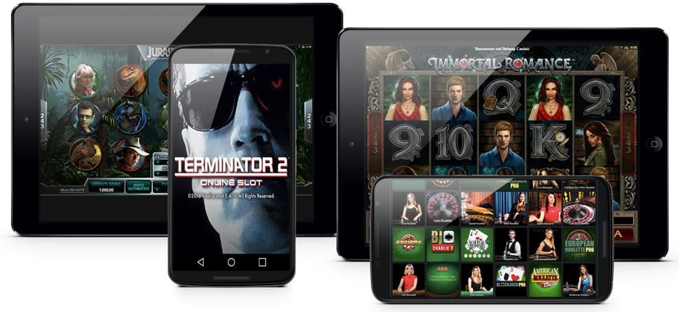 Diversi giochi slot e da tavolo prodotti da Microgaming su dei dispositivi mobile.
